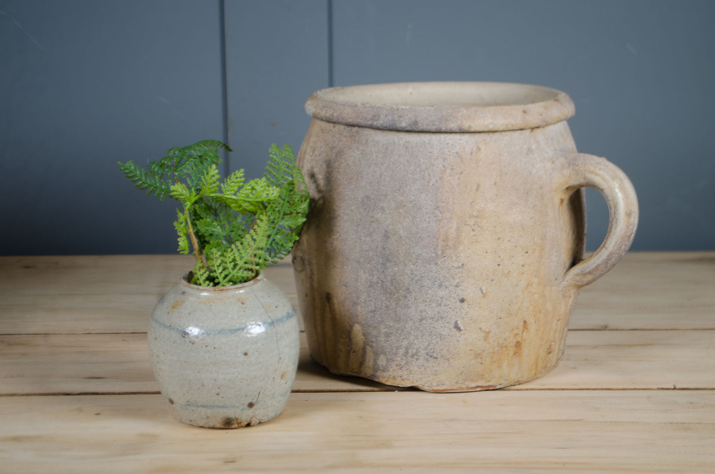 French country confit pots with hand-thrown stoneware forms and aged glaze.
