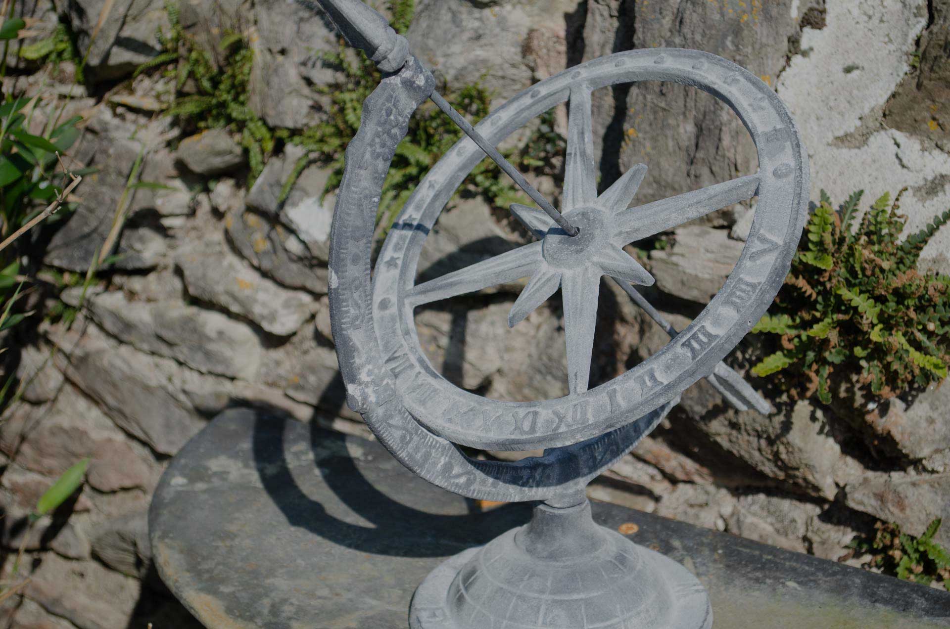 Iron sun dial