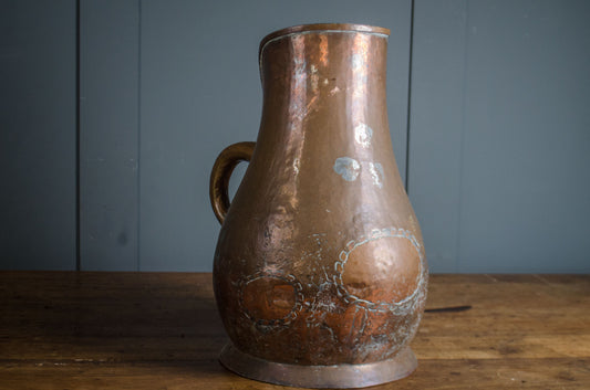 Large French provincial copper water jug with solder repairs