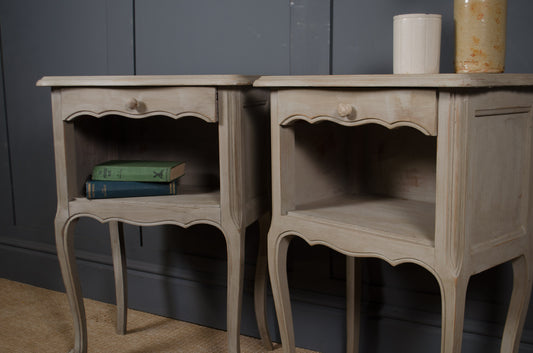 Louis XV style painted bedside tables with worn grey patina