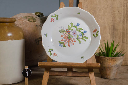French Quimper plate with traditional Breton figure decoration