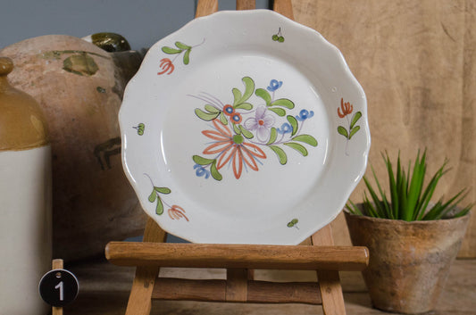 French Quimper plate with traditional Breton figure decoration