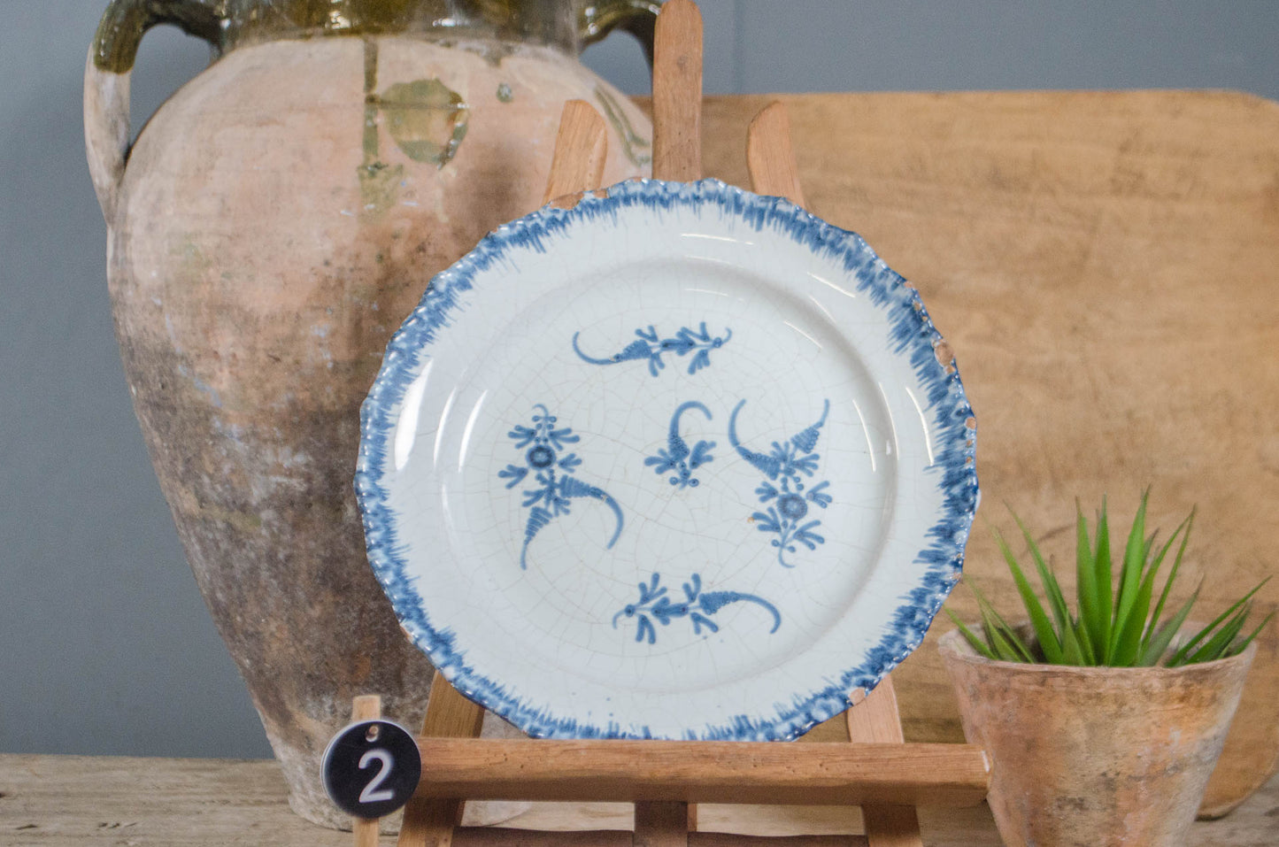 Antique French blue and white faience plate with floral decoration