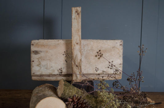 Weathered wooden storage trug with central handle