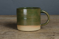 green handthrown mug