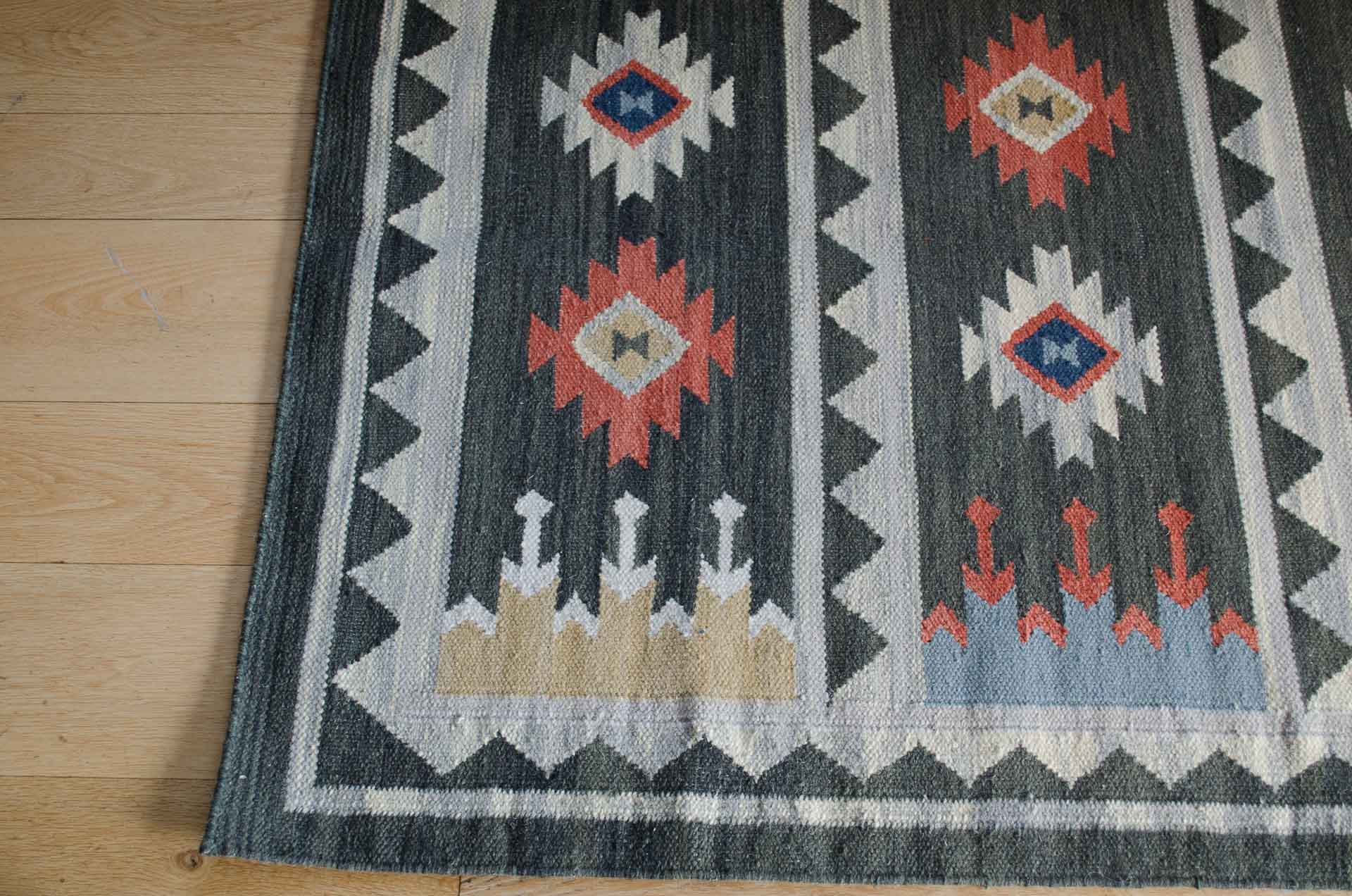 weaver green kilim rug
