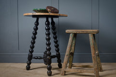 Victorian bobbin leg side table with tripod base and traditional turned wood detailing.