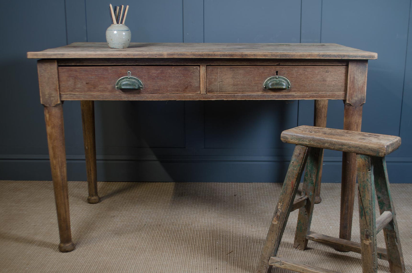 Antique oak desk with turned legs and original brass drawer handles