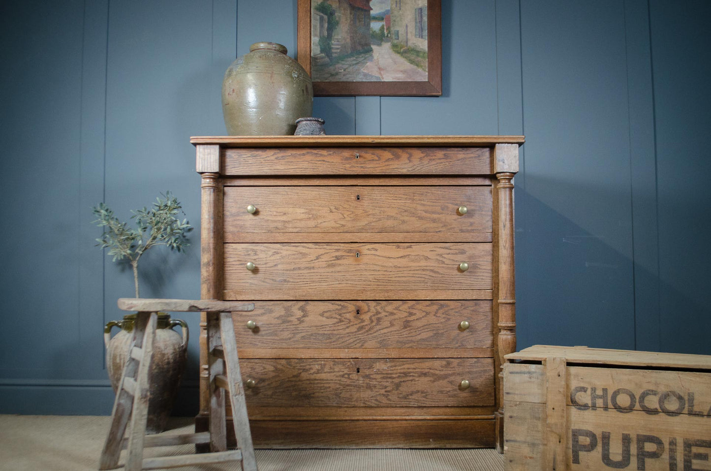 Antique French solid oak chest of drawers with column detailing