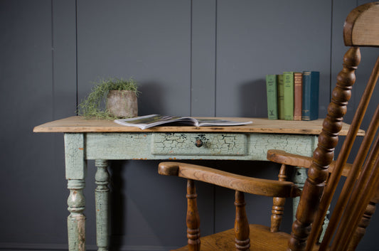 Small farmhouse kitchen table with plank pine top and painted base.