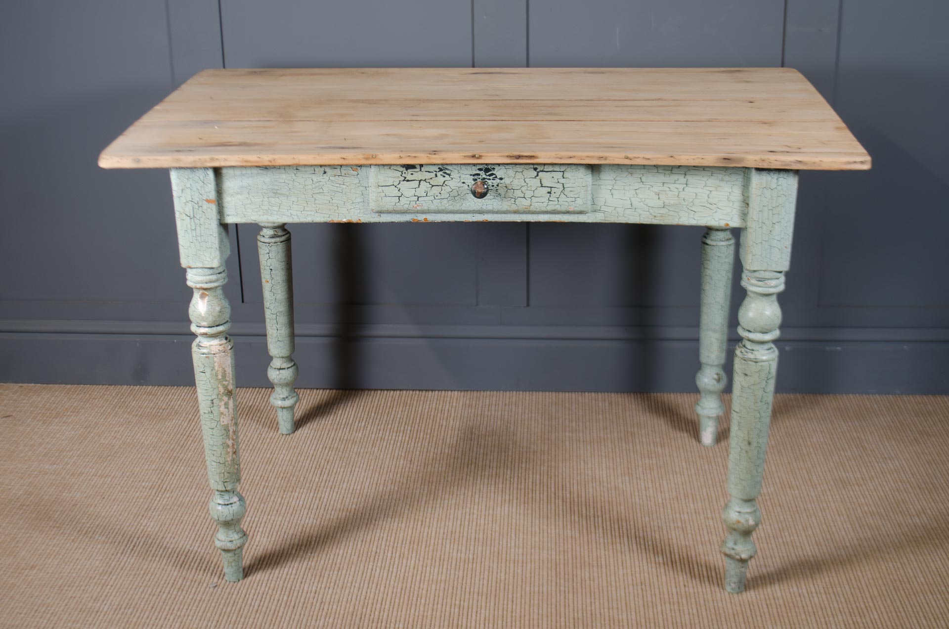 
Vintage pine desk with painted base and natural wood top.