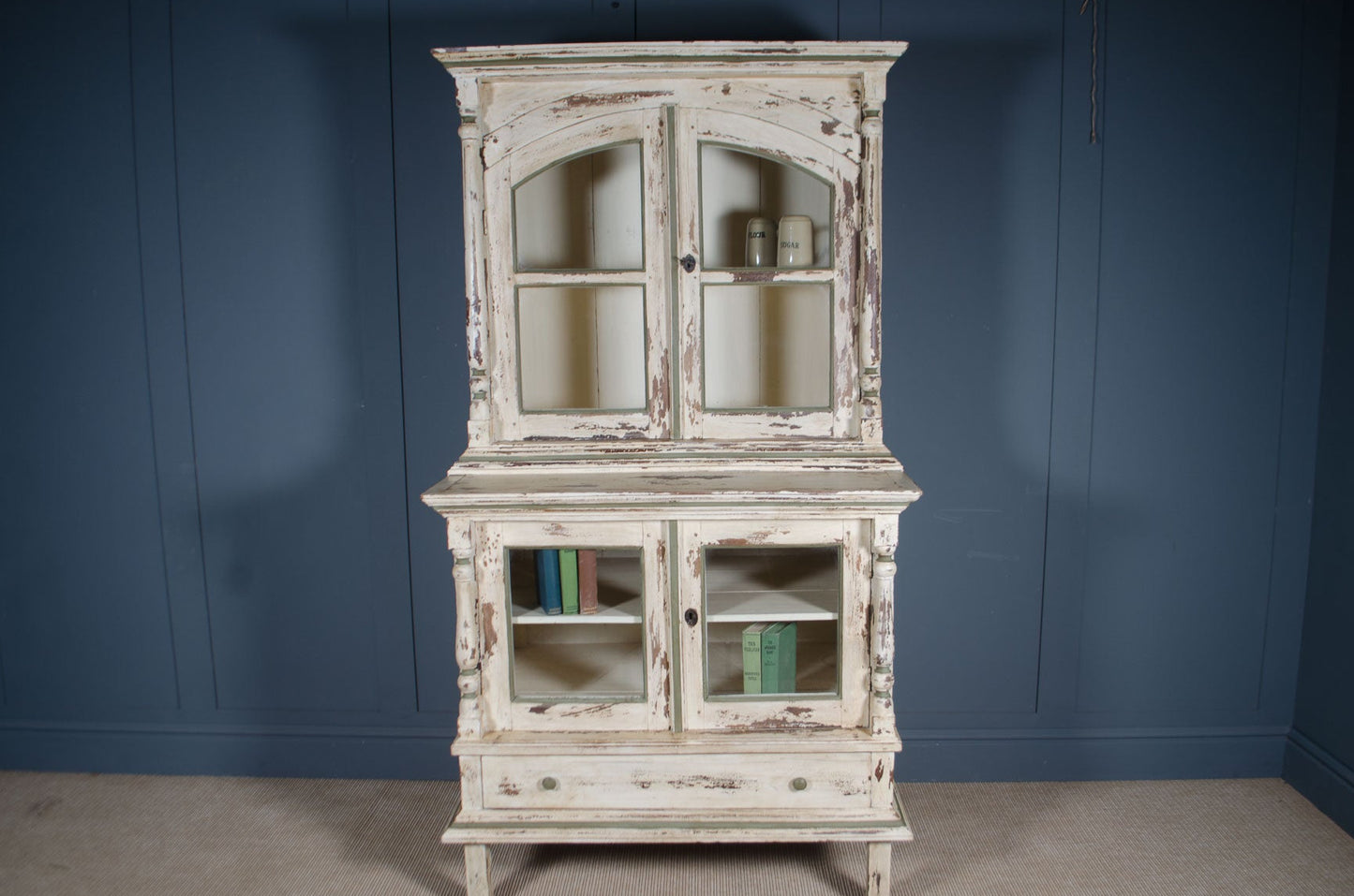Large painted display cabinet with glass doors and drawer storage