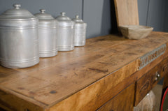 Rustic antique French workbench styled as a freestanding kitchen island