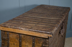 Vintage wooden trunk in dark wood with indian iron handles and locks