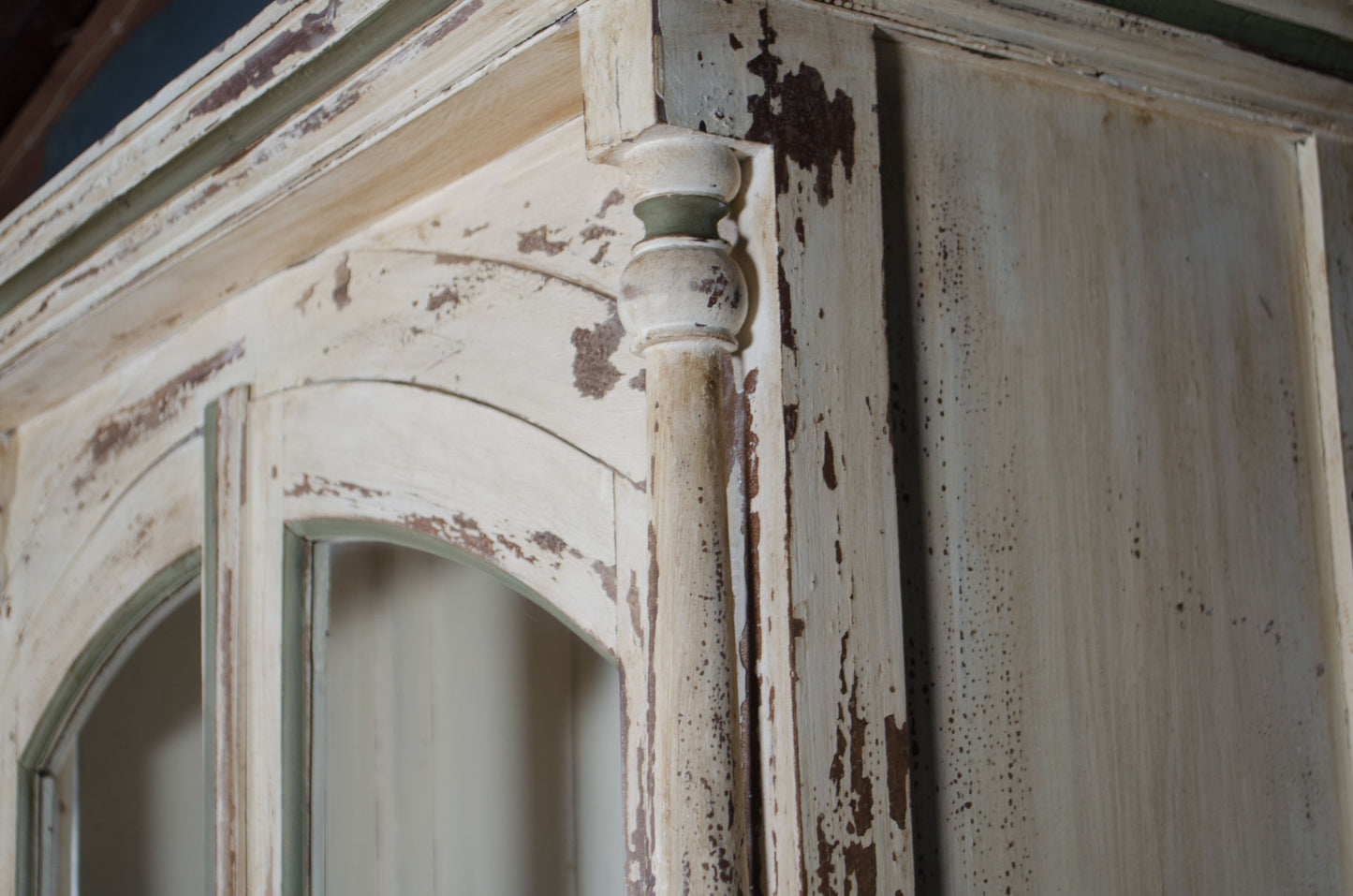 Solid wooden dresser cabinet in cream paint with green highlights