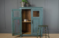 blue painted glass cupboard