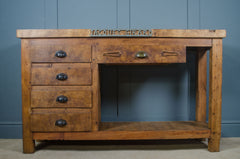 Antique farmhouse kitchen island made from a French blacksmith workbench