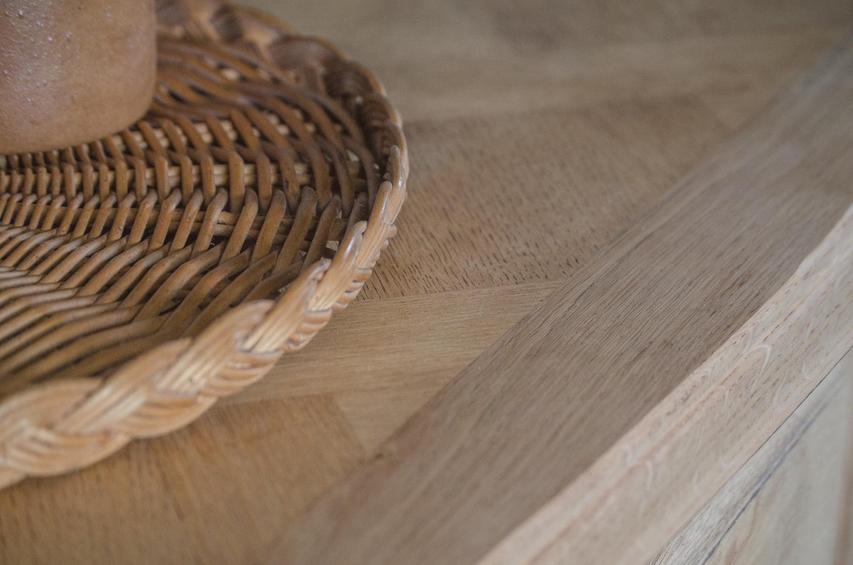 
Stripped oak sideboard with curved central cupboard door