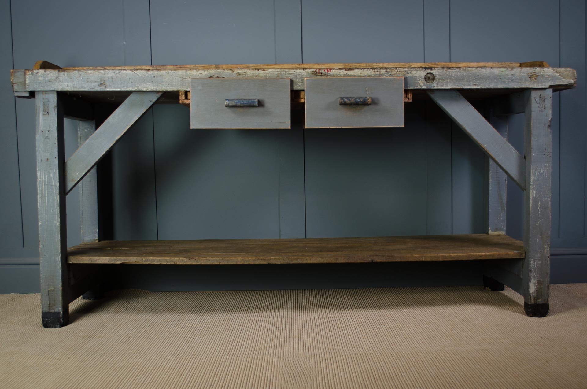 reclaimed wood kitchen island, antique workbench island, rustic farmhouse kitchen island, vintage kitchen island, repurposed wood furniture, industrial kitchen island, salvaged wood furniture, eco-friendly kitchen decor, sustainable home furniture, rustic kitchen island with storage