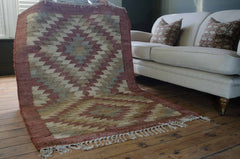 weaver green kilim rug