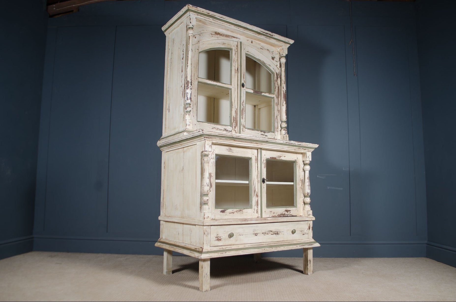 
Distressed cream kitchen dresser with glass front cupboards