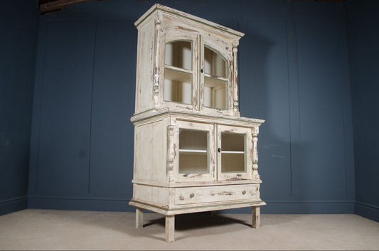 Distressed cream kitchen dresser with glass front cupboards