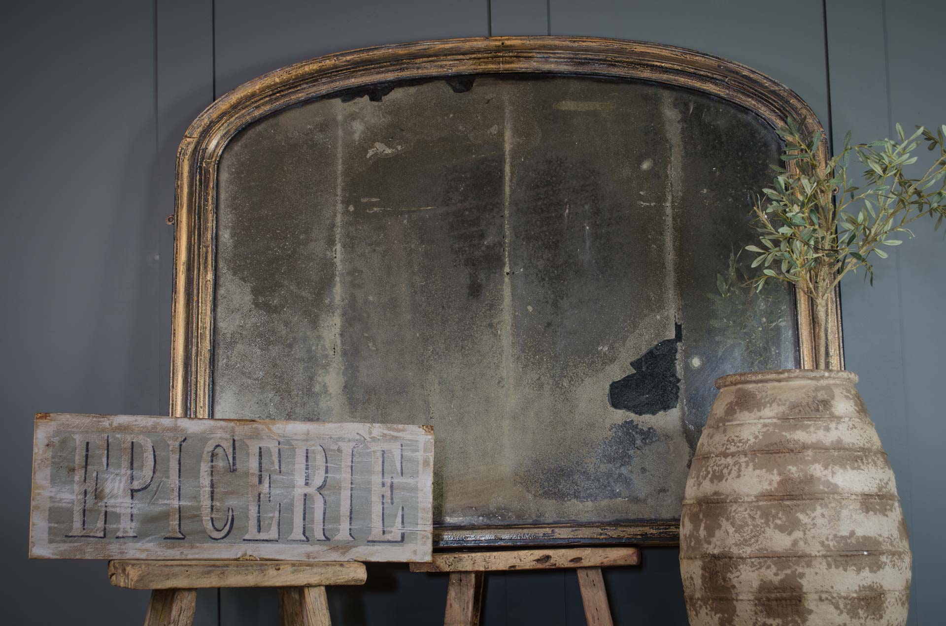 Antique over mantle foxed mirror