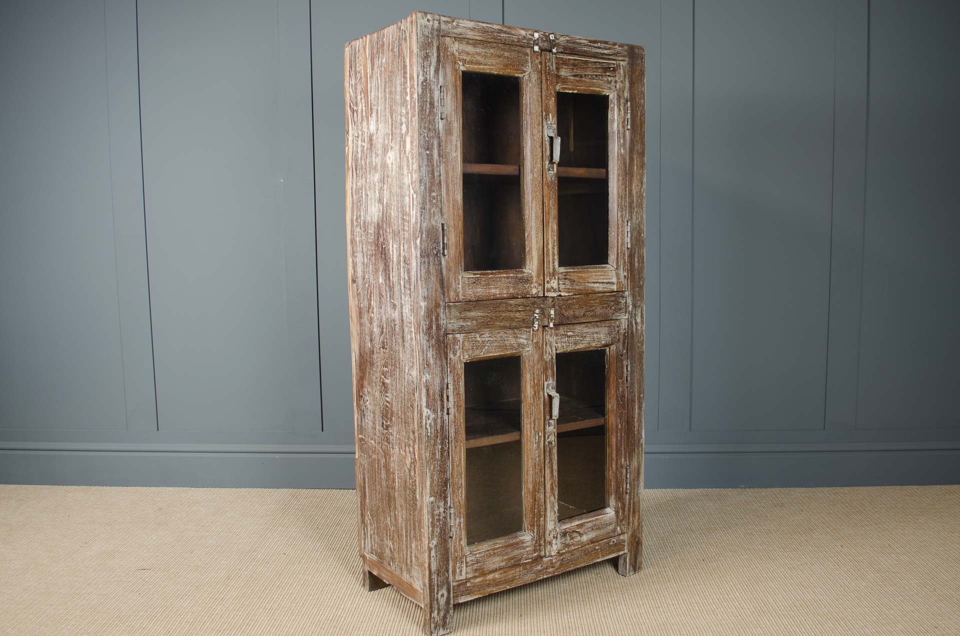 antique dresser with glass doors