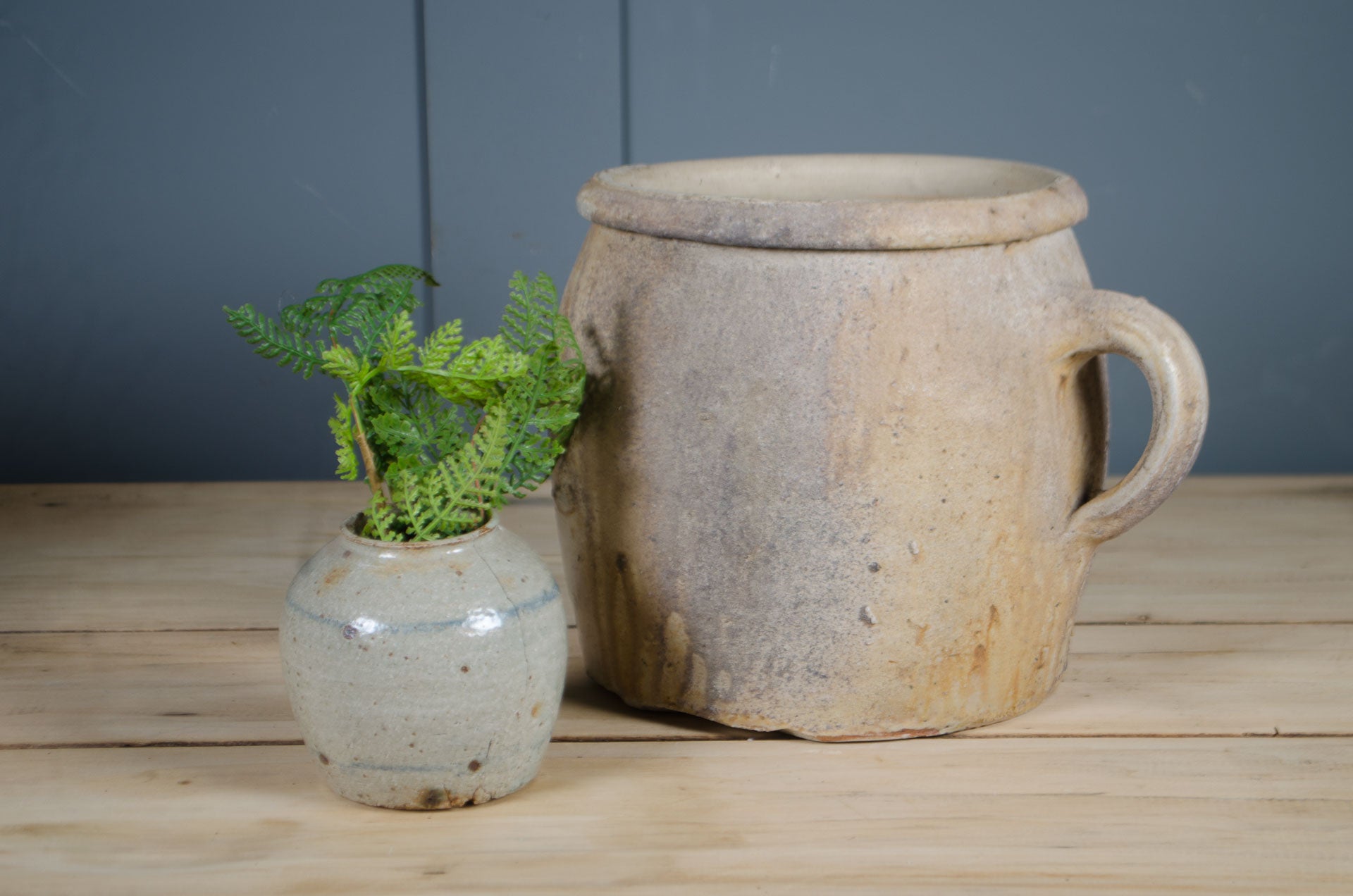 
French country confit pots with hand-thrown stoneware forms and aged glaze.