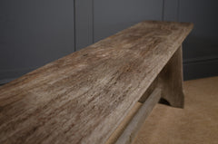 Rustic oak bench with cleaned and waxed weathered wood surface