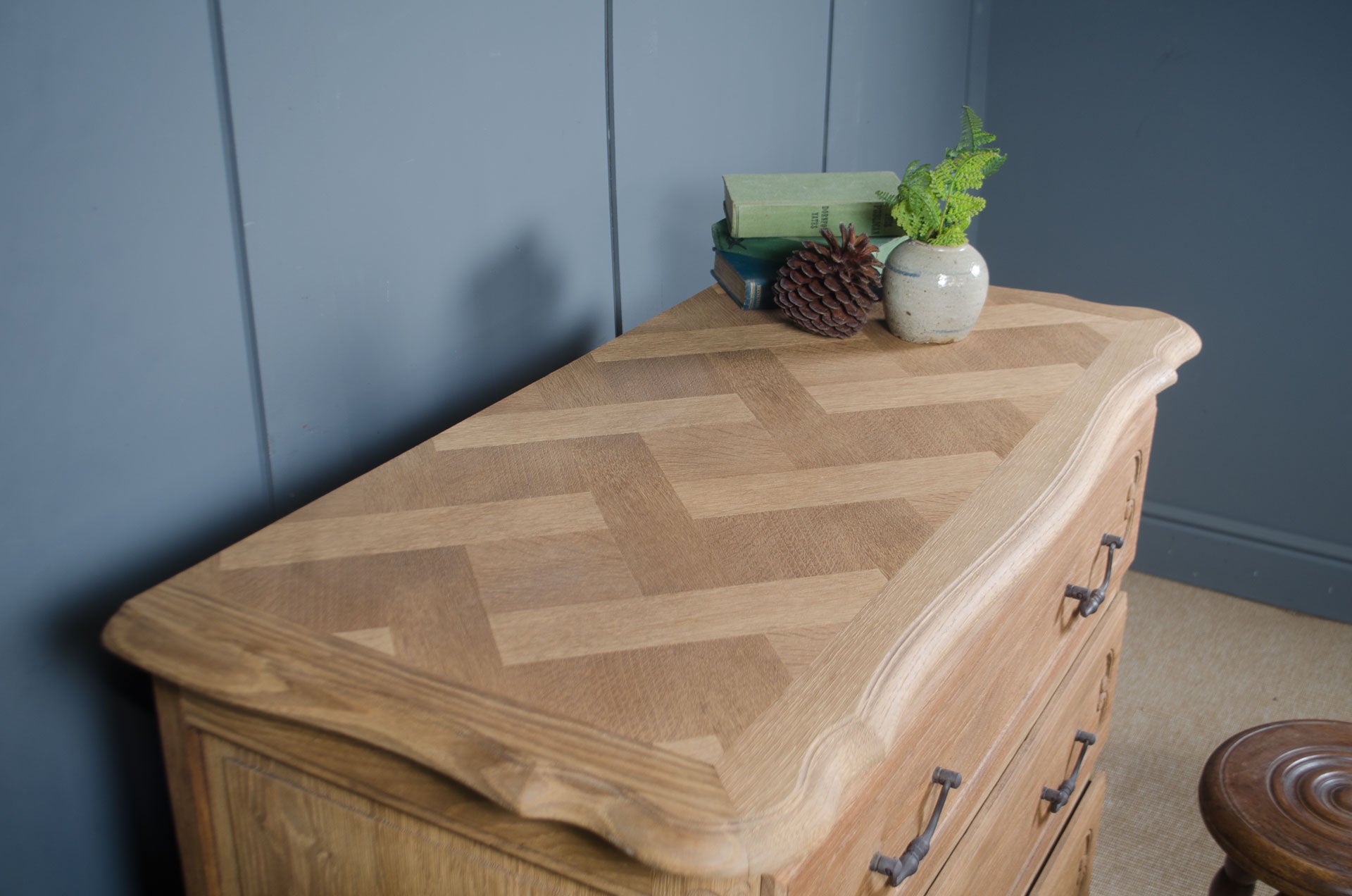 French antique oak chest of drawers with parquet top and iron handles
