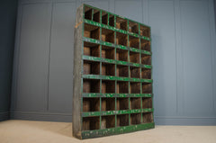 Reclaimed factory pigeon hole shelving unit