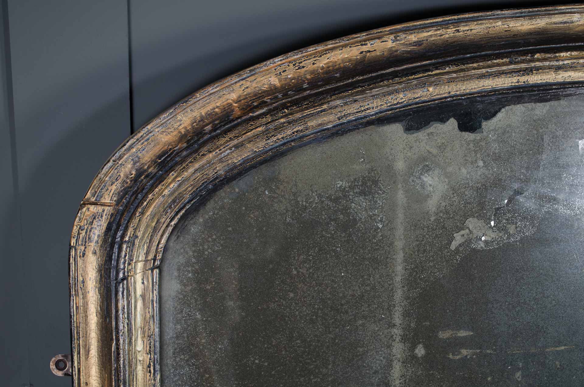 Antique over mantle foxed mirror