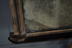 antique foxed gilt mirror