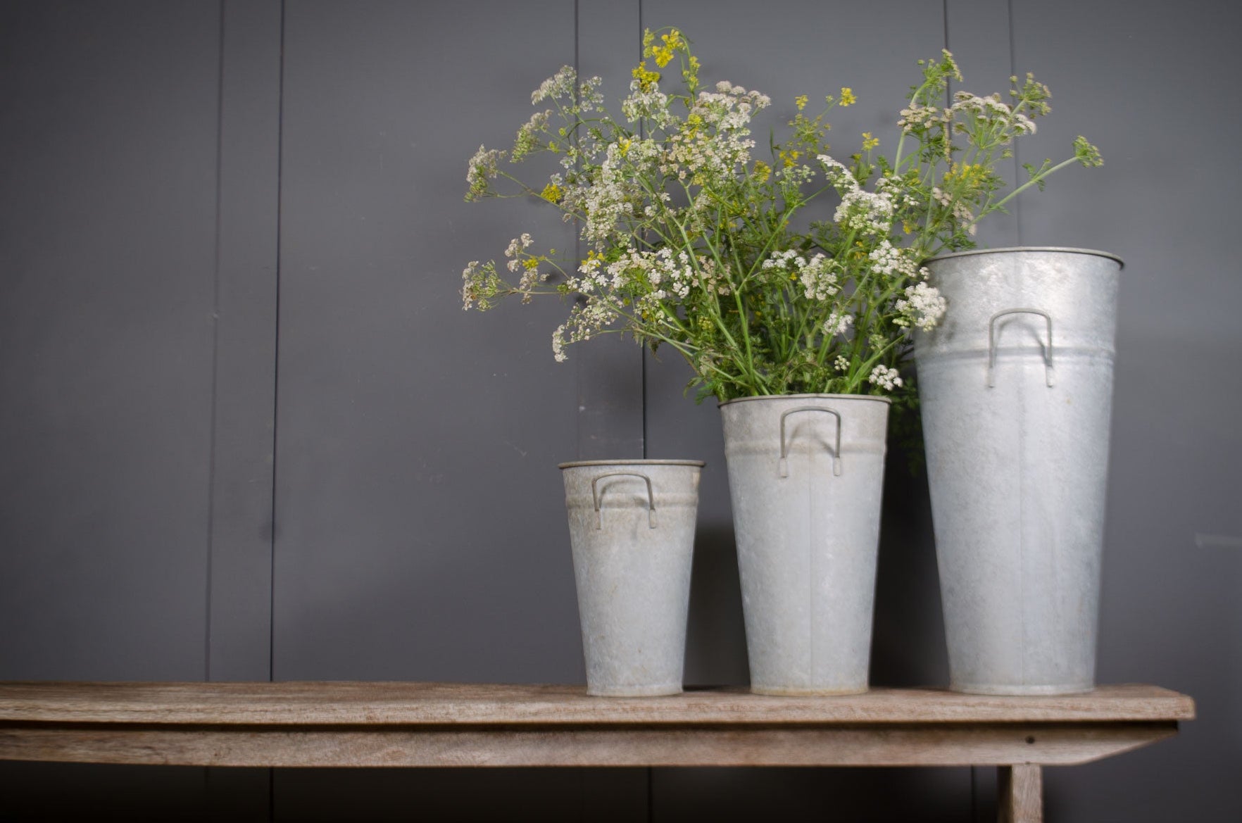 Vintage French galvanised flower buckets with weathered metal finish