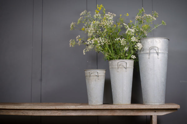 Vintage French galvanised flower buckets with weathered metal finish