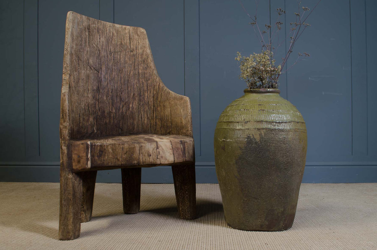 
Original hand-carved Nagaland trunk chair with weathered timber