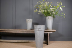 Aged galvanised florist containers with rustic weathered patina