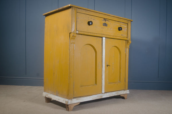 reclaimed European mustard cupboard