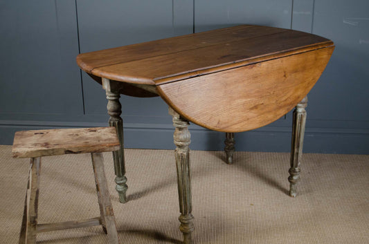 Antique French oak drop leaf round kitchen dining table
