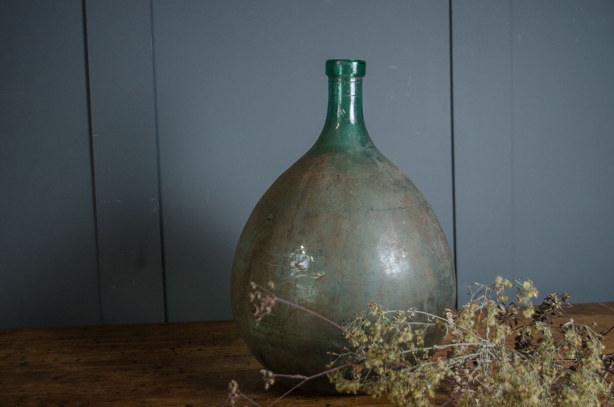 Hand blown French green glass demi john from Bordeaux