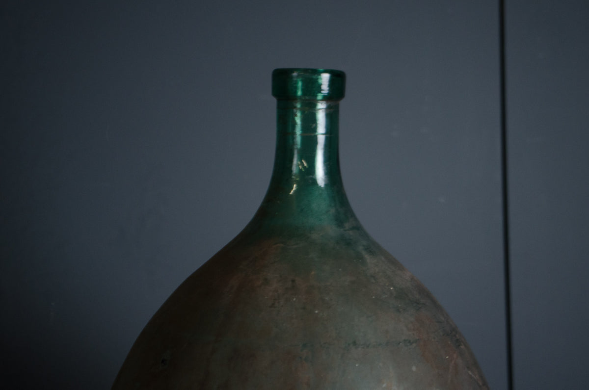 French green glass demi john decorative bottle
