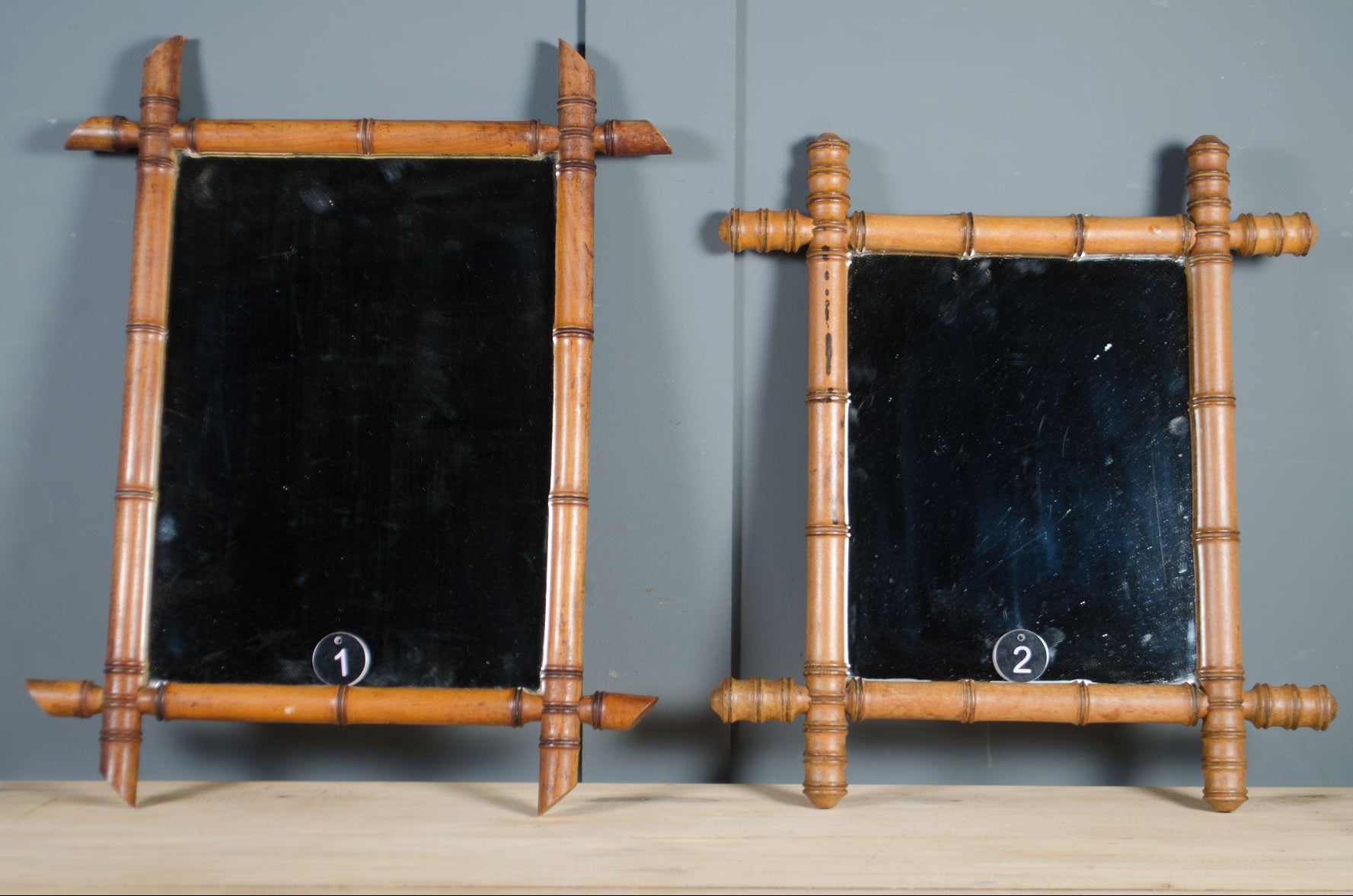 
Small French bamboo mirror with warm wooden tones and original mirror plate.