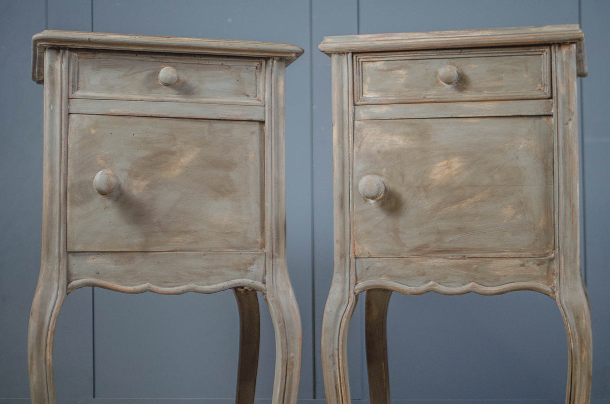 Distressed grey painted bedside tables with curved legs