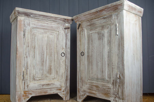 Pair of white washed bedside cupboards