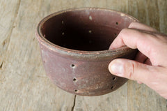 terracotta bowls with holes