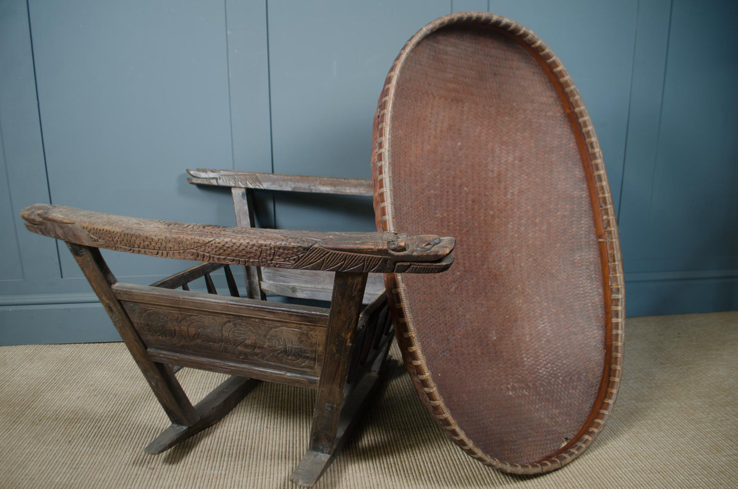 Antique Japanese hand woven cradle basket with carved wooden frame
