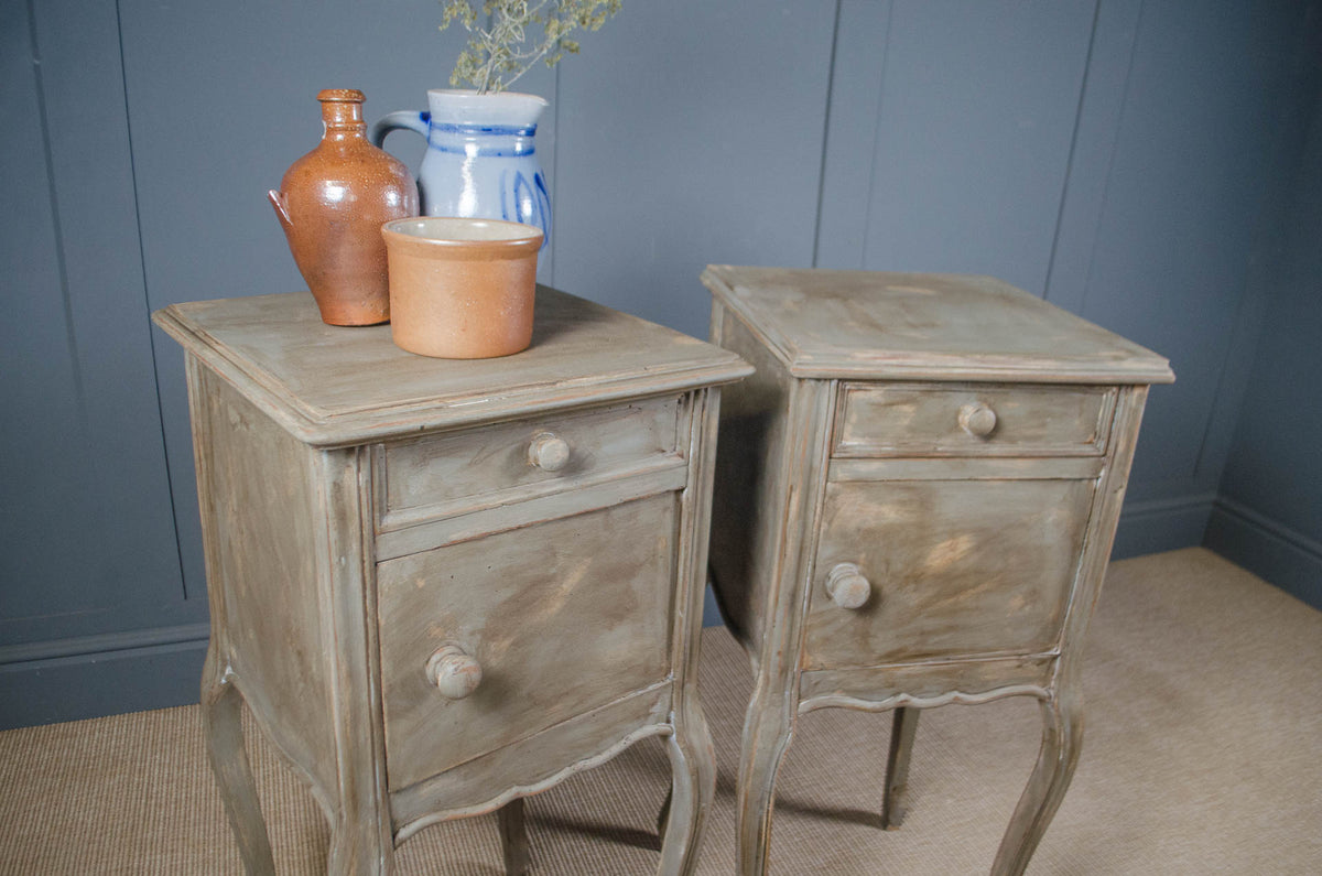 Matching French bedside tables with storage cupboards