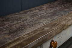 Close-up of a wooden surface with a dark background kitchen island reclaimed workbench