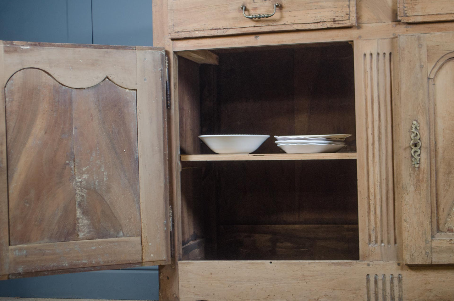 Pale stripped French provincial sideboard with panelled cupboard doors